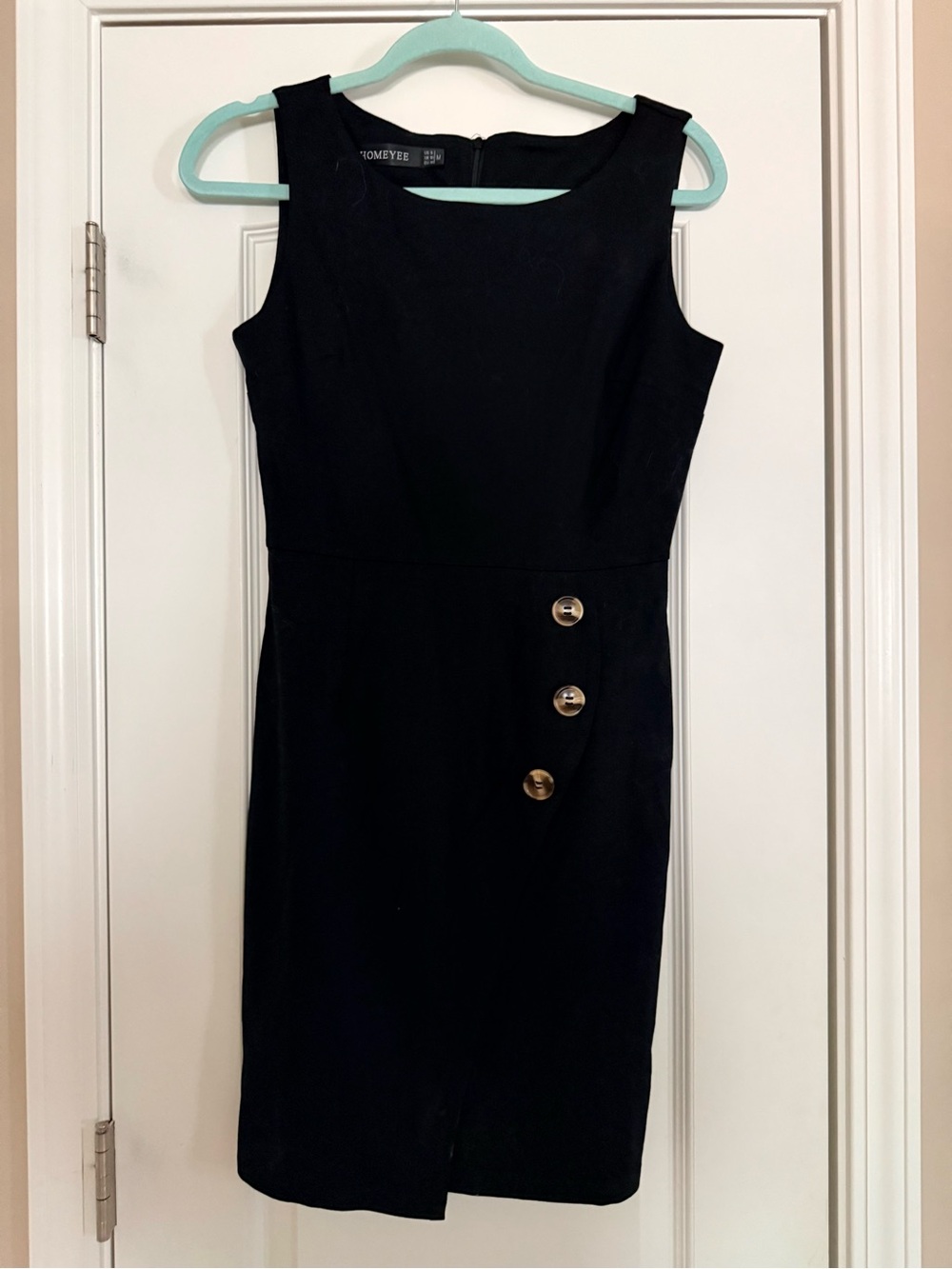 sleeveless black sheath dress with decorative buttons